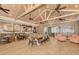 Community clubhouse with soaring wood ceilings, ceiling fans, stylish furniture, and coffee bar at 25207 Spartina, Venice, FL 34293