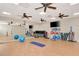 Bright workout room with exercise balls, mats, mirrors, and weight equipment for diverse fitness activities at 25207 Spartina, Venice, FL 34293