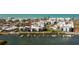 Stunning aerial view of waterfront condos with boat docks and community pool at 2955 N Beach Rd # D123, Englewood, FL 34223