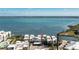 Aerial view of waterfront condos offering stunning views of the Gulf at 2955 N Beach Rd # D123, Englewood, FL 34223
