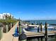 Picture-perfect view of boats docked along a pristine waterfront with clear skies and lush surroundings at 2955 N Beach Rd # D123, Englewood, FL 34223