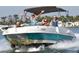 Group of people boating and enjoying a sunny day on the water with fun and good times at 2955 N Beach Rd # D123, Englewood, FL 34223