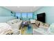 Inviting living room with panoramic water views, stylish furnishings and calming decor for a serene experience at 2955 N Beach Rd # D123, Englewood, FL 34223