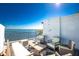 Enjoy scenic water views and fresh air on this rooftop deck with comfortable outdoor seating at 2955 N Beach Rd # D123, Englewood, FL 34223