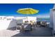 Relax on this rooftop deck with a table and chairs and enjoy the views of the water at 2955 N Beach Rd # D123, Englewood, FL 34223