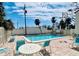 The community pool features outdoor seating, ideal for relaxation at 2985 N Beach Rd # Bv-5, Englewood, FL 34223