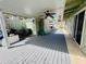 Exterior showing covered patio, yard, walkway, and carport at 2985 N Beach Rd # Bv-5, Englewood, FL 34223