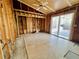Bright room featuring wood framing and a sliding door that leads to the patio at 2985 N Beach Rd # Bv-5, Englewood, FL 34223