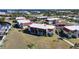 Condominium in a waterfront community, showing landscaping and covered parking at 311 Garvin St # 209C, Punta Gorda, FL 33950