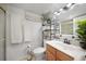 The bathroom features a modern sink, ample lighting, decorative accents, and modern toilet at 311 Garvin St # 209C, Punta Gorda, FL 33950