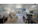 Open living room with access to balcony, seamlessly connecting indoor and outdoor spaces at 311 Garvin St # 209C, Punta Gorda, FL 33950
