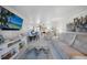 Bright living room that flows to dining area and kitchen with a coastal vibe at 311 Garvin St # 209C, Punta Gorda, FL 33950