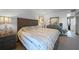 Spacious bedroom features neutral decor, soft carpet, and stylish decor elements at 311 Garvin St # 209C, Punta Gorda, FL 33950