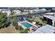 A sparkling community pool is nestled between condos and a canal, offering a relaxing retreat with dock access at 311 Garvin St # 209C, Punta Gorda, FL 33950