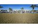 Lush lawn with waterfront views and boat docks at 311 Garvin St # 209C, Punta Gorda, FL 33950