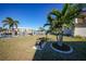 Waterfront view with benches, palm trees and boat docks at 311 Garvin St # 209C, Punta Gorda, FL 33950