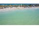 Wide aerial view showing property relative to shoreline and ocean at 4078 N Beach Rd, Englewood, FL 34223