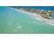 Wide aerial view showcasing property relative to Gulf of Mexico at 4078 N Beach Rd, Englewood, FL 34223