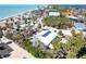 Aerial view showing the home's proximity to the beach and ocean at 4078 N Beach Rd, Englewood, FL 34223