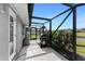 Relaxing patio area with an outdoor grill, offering a perfect spot for outdoor cooking and entertainment at 431 Rotonda Cir, Rotonda West, FL 33947