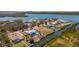 Overhead shot of neighborhood and waterway showing location of property and nearby residential communities at 50 Spyglass Aly, Placida, FL 33946