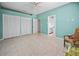 Bedroom features tile flooring and closet space at 50 Spyglass Aly, Placida, FL 33946