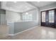 A clean, bright entryway with tile flooring and a view to a bonus space at 50 Spyglass Aly, Placida, FL 33946