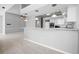 Open kitchen with a long counter/breakfast bar and stainless steel appliances at 50 Spyglass Aly, Placida, FL 33946