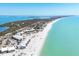 Stunning aerial view of beachfront community with white sand beaches and turquoise waters at 5000 Gasparilla Rd # 41B, Boca Grande, FL 33921