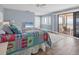 Serene bedroom with a private balcony offering breathtaking ocean views and gentle light at 5000 Gasparilla Rd # 41B, Boca Grande, FL 33921