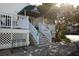 An exterior shot of a pro shop and the entrance to the tennis center court at 5000 Gasparilla Rd # 41B, Boca Grande, FL 33921