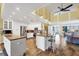 Spacious eat-in kitchen with a vaulted ceiling and stainless appliances at 5000 Gasparilla Rd # 41B, Boca Grande, FL 33921