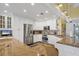Bright updated kitchen features custom cabinetry, countertops, and stainless appliances at 5000 Gasparilla Rd # 41B, Boca Grande, FL 33921