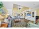 Open floor plan showing living room, kitchen, and staircase at 5000 Gasparilla Rd # 41B, Boca Grande, FL 33921
