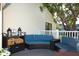 Cozy outdoor lounge features cushioned seating and a beverage station under a canopy at 5000 Gasparilla Rd # 41B, Boca Grande, FL 33921