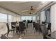 Elegant waterfront restaurant with scenic ocean views, stylish wicker seating, and ceiling fans at 5000 Gasparilla Rd # 41B, Boca Grande, FL 33921