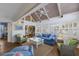Comfortable living room boasts vaulted ceilings, ample seating, and natural light at 5000 Gasparilla Rd # Vh37, Boca Grande, FL 33921