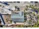 Aerial view of a single Gathering home featuring a gray roof at 6035 Manasota Key Rd, Englewood, FL 34223