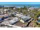 Coastal home with beach access and fenced yard near tropical palm trees and ocean views at 6035 Manasota Key Rd, Englewood, FL 34223