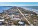 Beautiful coastal community with homes, beaches and long road along the ocean shoreline at 6035 Manasota Key Rd, Englewood, FL 34223