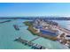 Breathtaking aerial view showcases the waterfront community, complete with docks and serene turquoise waters at 6040 Boca Grande Cswy # A2, Boca Grande, FL 33921