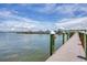 Scenic view of a boat dock on the water, equipped with pilings and moorings, providing access to boating activities at 6040 Boca Grande Cswy # A2, Boca Grande, FL 33921