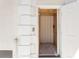 Residential elevator featuring interior lighting, striped wall coverings, and neutral carpeting at 62 Tarpon Way, Placida, FL 33946