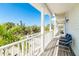 Spacious outdoor deck provides serene views of lush greenery and a peaceful retreat at 62 Tarpon Way, Placida, FL 33946