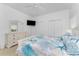 Beautiful bedroom features a flat screen TV, large closets, and a dresser at 632 Boundary Blvd, Rotonda West, FL 33947