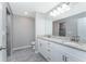 Bathroom with granite countertops, double vanity, and walk-in shower at 6602 David Blvd, Port Charlotte, FL 33981