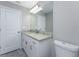 Bright bathroom with granite countertops and storage at 6602 David Blvd, Port Charlotte, FL 33981