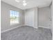 Bedroom features natural light and closet space at 6602 David Blvd, Port Charlotte, FL 33981