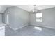 Dining area features natural light, neutral walls, and wood-look flooring at 6602 David Blvd, Port Charlotte, FL 33981