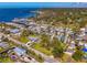 Stunning aerial view of a coastal community with waterfront homes and a scenic marina at 698 & West W Perry St, Englewood, FL 34223